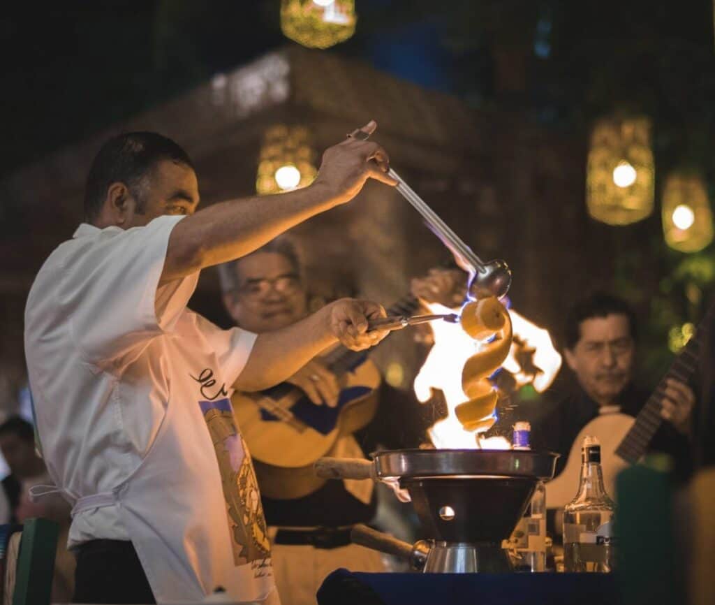Tableside cooking and musicians at Edith’s Restaurante