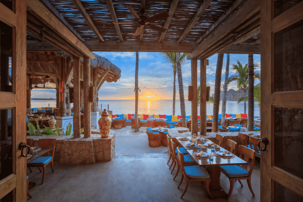 Open-air dining beside the bay at Hacienda Cocina y Cantina