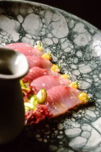 A crudo of raw fish plated at Lumbre