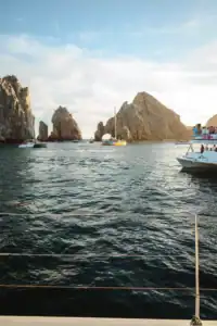 Golden-hour view of Land's End rock formations from the EcoCat sunset cruise