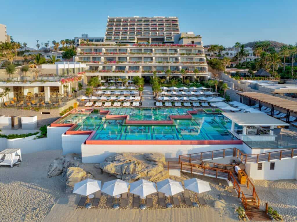 Grand Velas Boutique — tiered resort above the pool terrace and the beach parasols