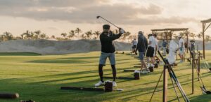 Golfers practicing at Costa Palmas Golf Club