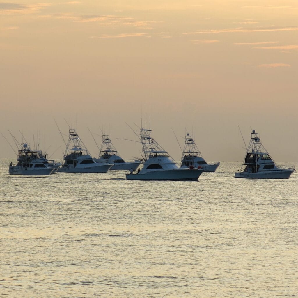 Sportfishing boats leaving Buena Vista at dawn during Bisbee’s East Cape Offshore