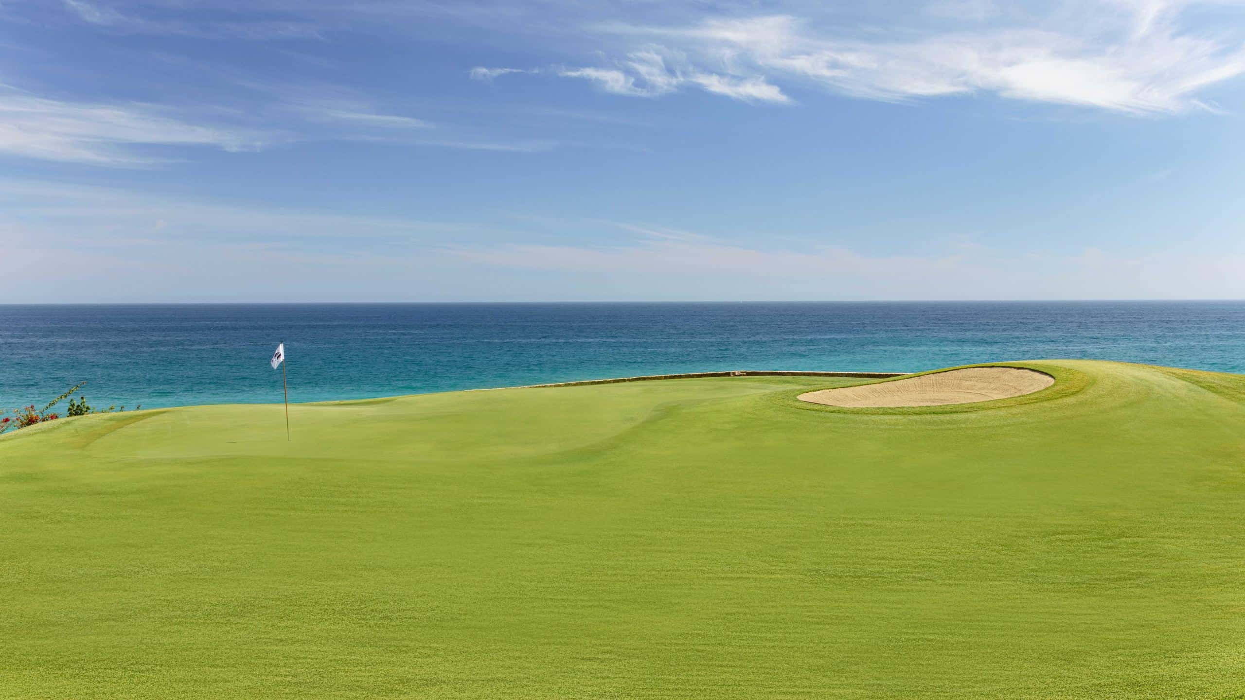 El Dorado golf green with a bunker above the Sea of Cortez
