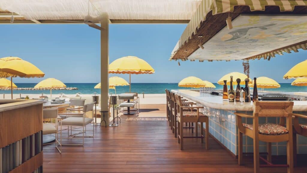 Yellow umbrellas on the sand at El Puesto