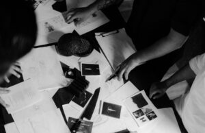 Black-and-white scene of the Humo team designing fire-cooked dishes, Zadún a Ritz-Carlton Reserve