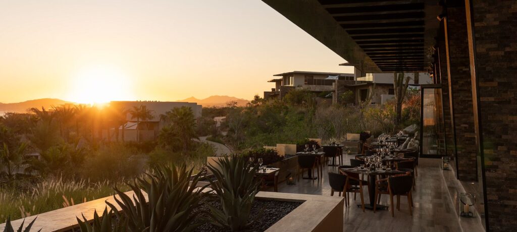 Humo terrace at sunset with dining tables, agave and Sea of Cortez views, Zadún a Ritz-Carlton Reserve