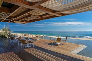 Open-air beachfront dining deck at Mako beside the infinity pool, Solaz a Luxury Collection Resort