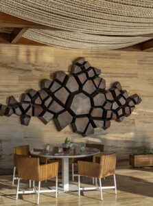 Mako dining room with a sculptural fish wall installation and woven ceiling, Solaz a Luxury Collection Resort