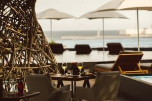 NIDO terrace with the woven nest structure, lounge seating and Sea of Cortez view at Viceroy Los Cabos