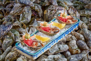 Baja oysters on the half shell served on ice with lemon at Tres Sirenas, Cabo San Lucas