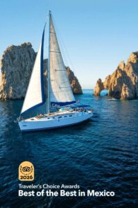 Beneteau sailboat approaching Land's End during Luxury Cabo Sailing