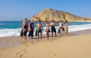 Small Cabo Trek snorkeling group standing on a Los Cabos beach