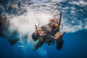 Scuba participant entering the water during a Dive Cabo outing
