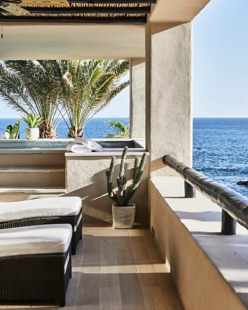 A villa terrace at Esperanza with loungers looking out over the sea