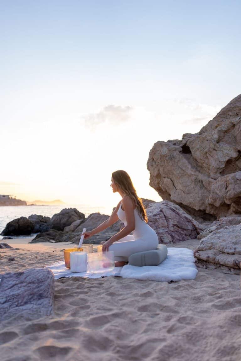 Crystal singing bowl sound healing set up on a beach in Los Cabos for a private experience