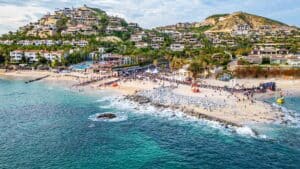 Aerial view of Palmilla Beach on race day, the IRONMAN 70.3 Los Cabos swim start, from ironman.com
