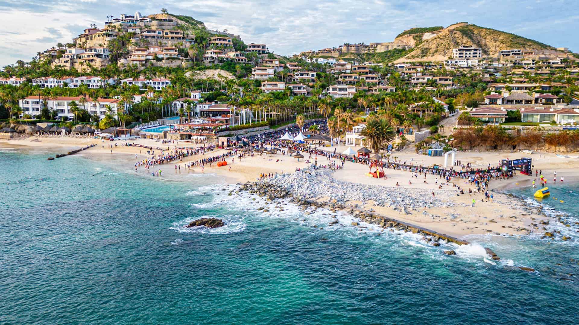 Aerial view of Palmilla Beach on race day, the IRONMAN 70.3 Los Cabos swim start, from ironman.com