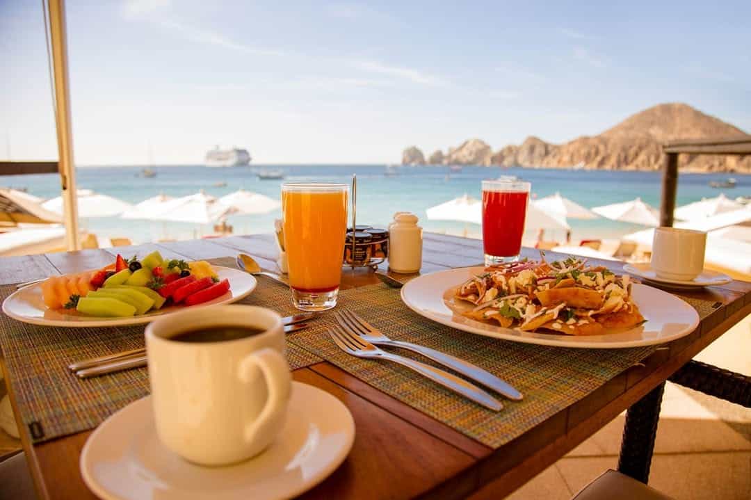 Breakfast with fruit, coffee and chilaquiles overlooking the Sea of Cortez.